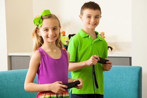 kids play a video game